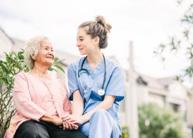 Nurse assisting patient post discharge